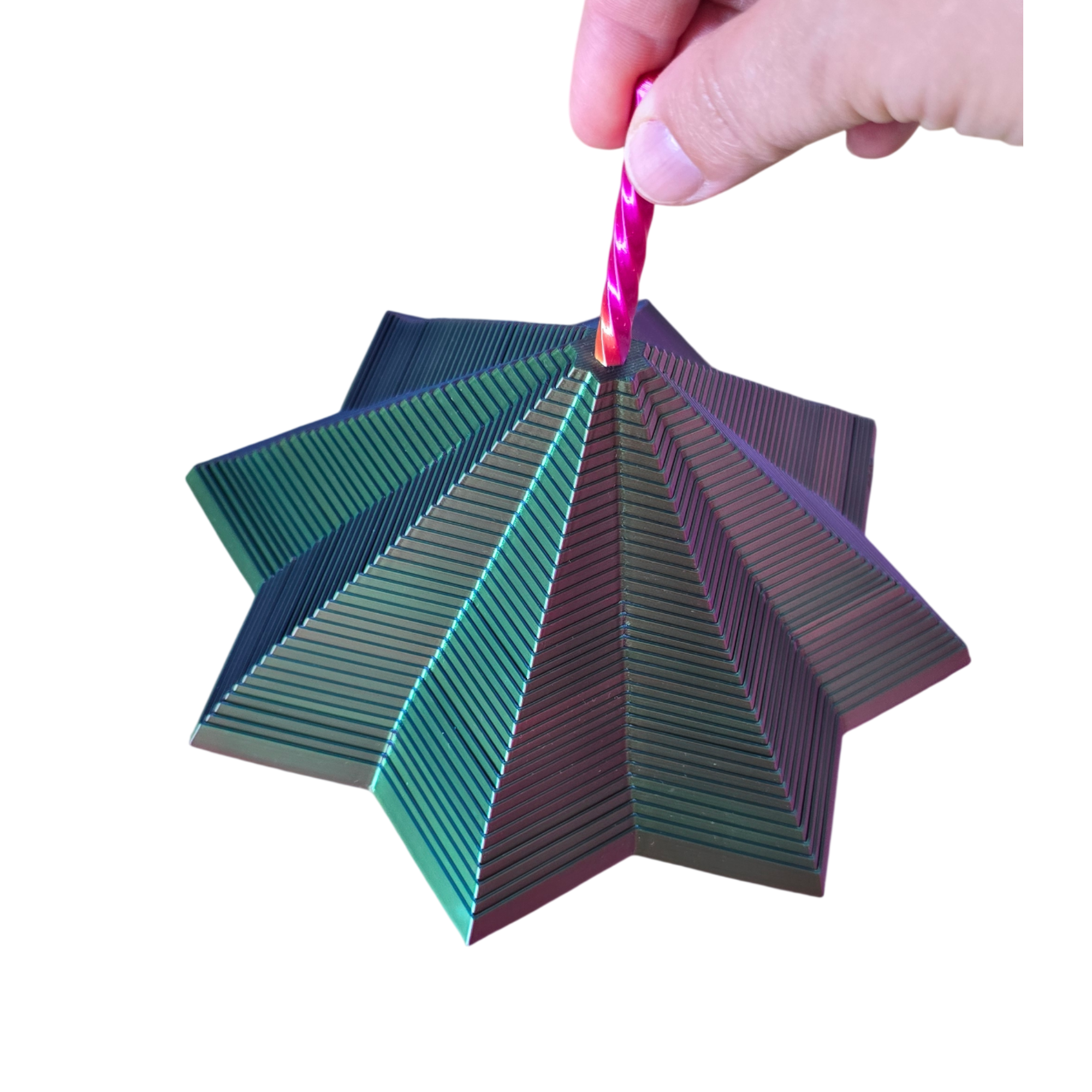 Mão a segurar Estrela Sensorial Sensoria pelo cabo rosa — brinquedo fidget